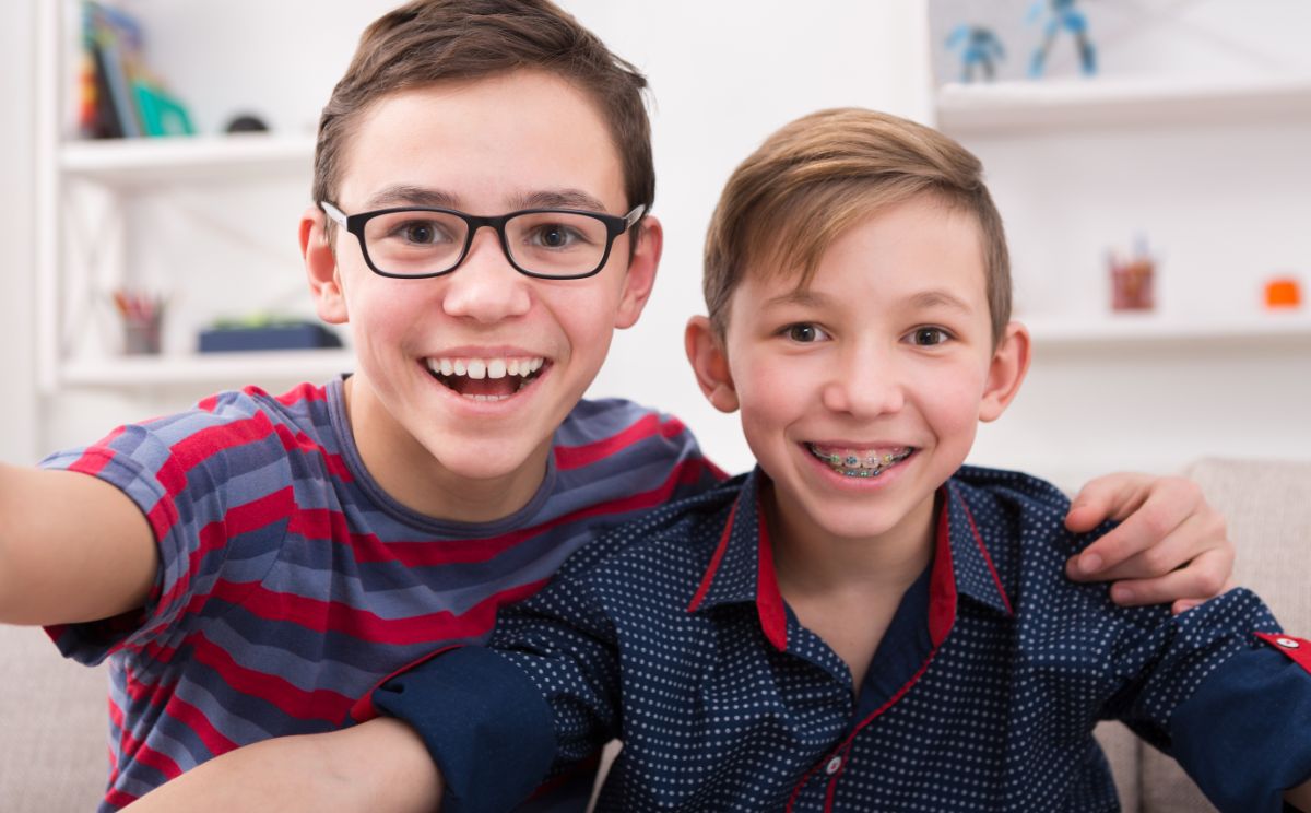 Boys smiling Orthodontic Care: No Referral Necessary